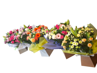 Florist’s Choice Box - A beautiful florist’s choice box arrangement, individually handcrafted using a colourful selection of fresh seasonal flowers.