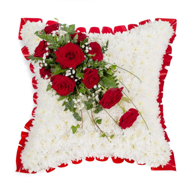 Cushion - A traditional cushion tribute with elegant red and white tones, created to express love and remembrance.